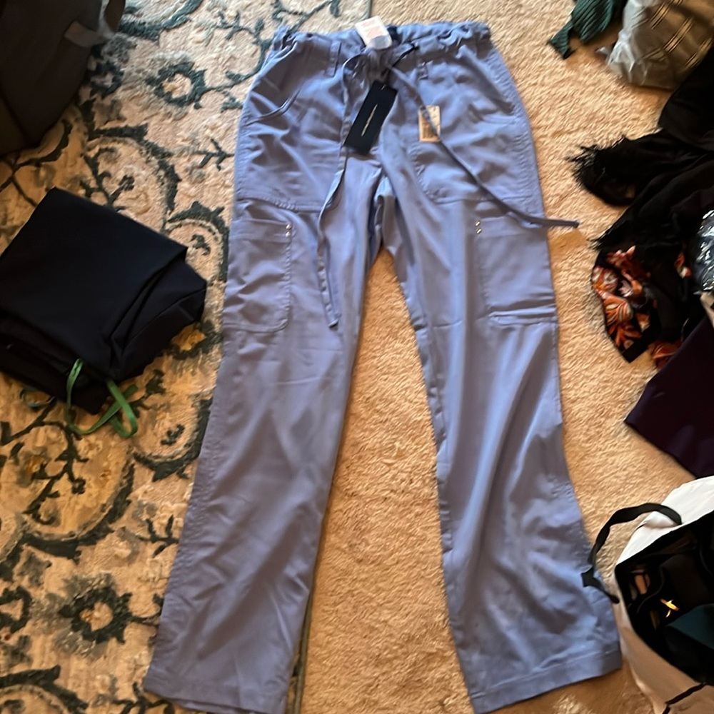 NWT blue koi Sapphire scrub pants. Size xs.